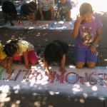 Youngsters chalk "Responsibility" during a Values Project workshop held at Kids Kamp in south Natomas last month. Stencils and chalk will be available for children to chalk in a closed off parking lot at Celebrate Natomas on Sept. 7.
