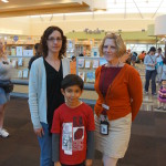 Akshaj Mehta with North Natomas Library staff. / Photo Courtesy Sumiti Mehta