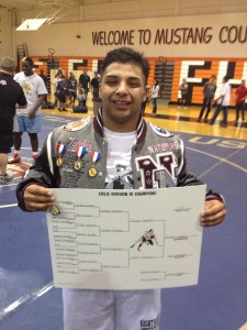 Natomas senior Jordan Sepeda wins D-III title at 220 pounds. Photo: T. Horn