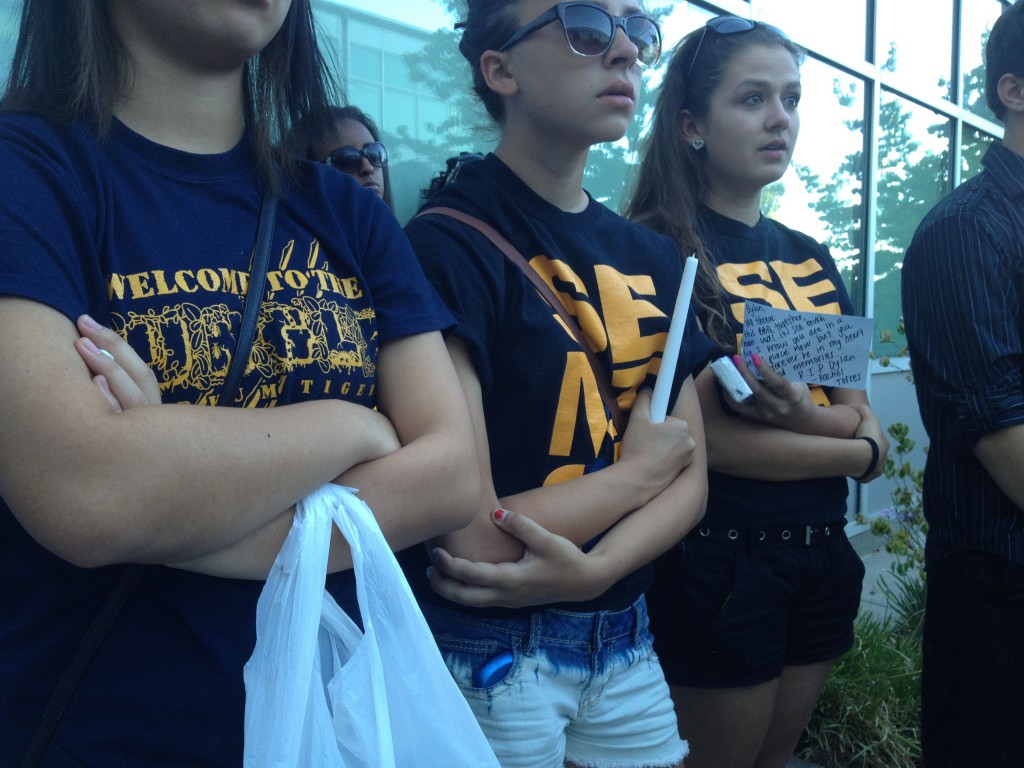 Several class of 2013 graduates were among the mourners at the vigil.