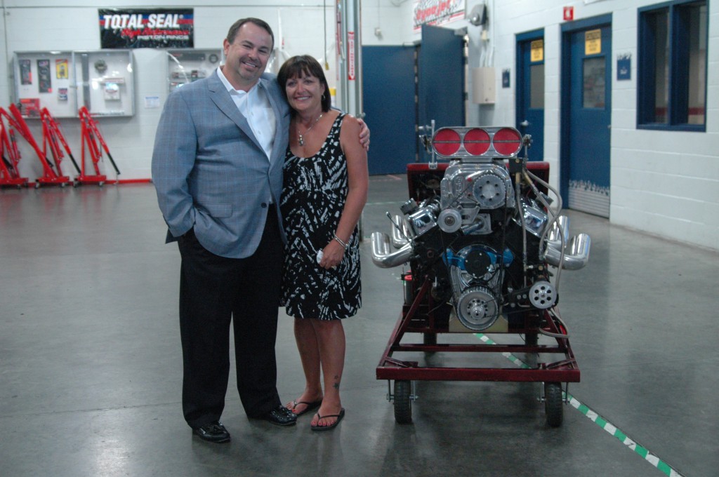 Ron Whitman's widow, Judy, with interim Campus President Roger Speer.