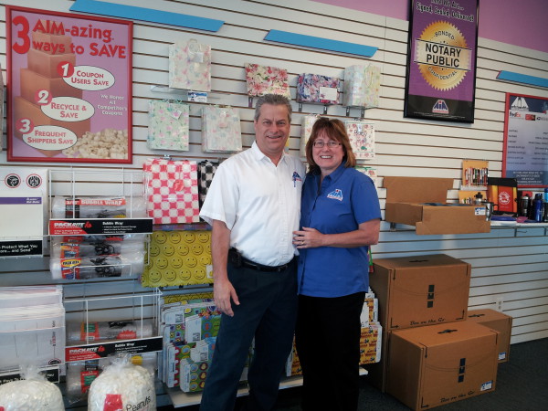 AIM Mail Center owners Dan and Susan Trescott.