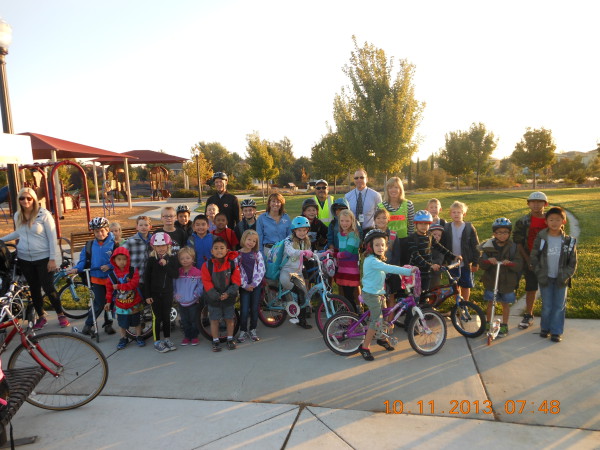 Heron School students assemble at Burberry Park and join the Walking School Bus that meets every Friday. School principal Marci Bernard and Natomas school district administrator Mike Reed also participated in the walk.