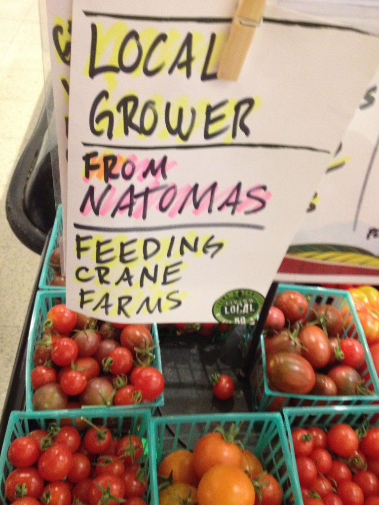 Feeding Crane Farms produce on sale at the Raley's store in Natomas.