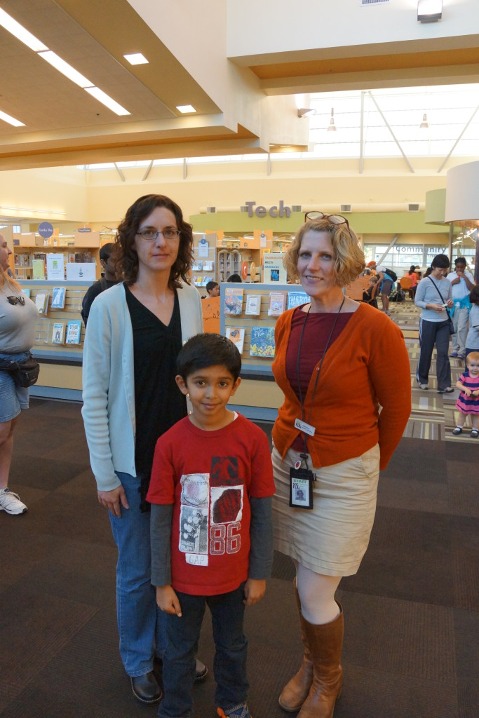 Akshaj Mehta with North Natomas Library staff. / Photo Courtesy Sumiti Mehta