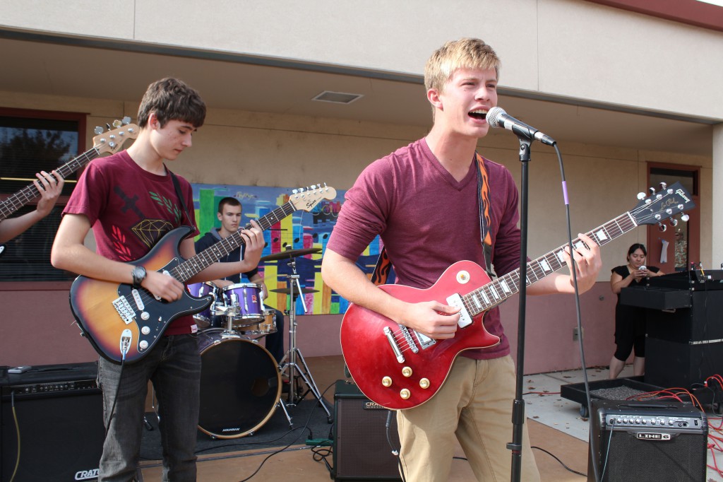 1669: Chase Avalos (right) and Jacob Stevens perform at the homecoming parade (November 14, 2013).