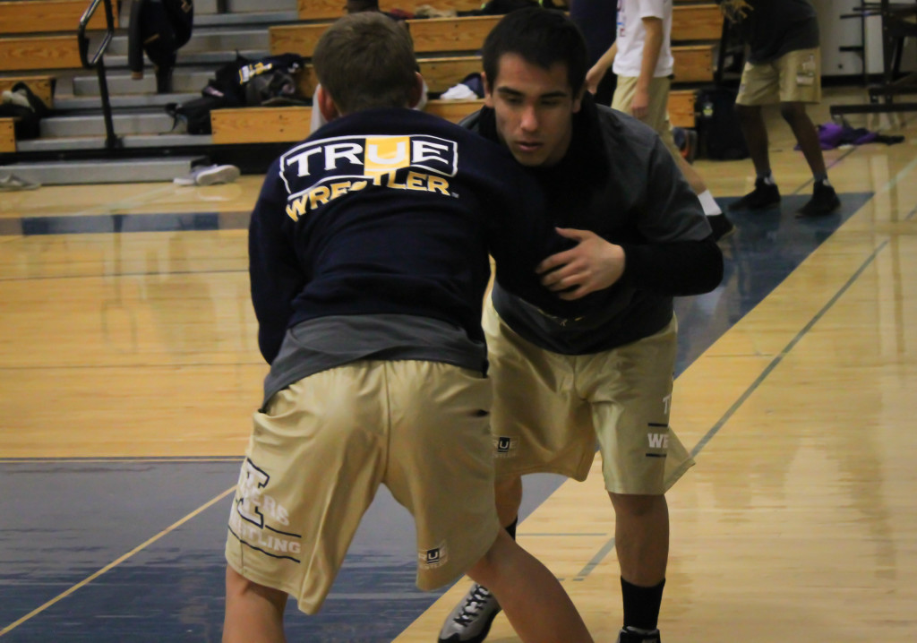 Escalante spars with a teammate to warmup for a recent duel match. / Photo: Jeremiah McWright