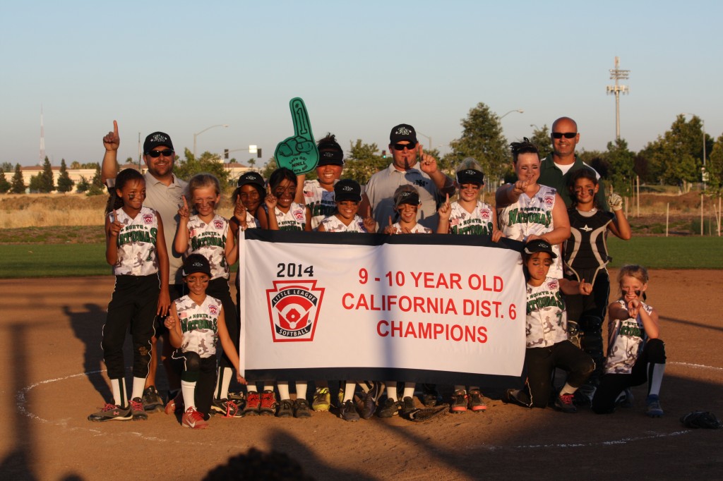 The North Natomas Little League 9-10 Softball team shortly after their win at the District 6 championship against Rio Linda. / Photo: T. Perez