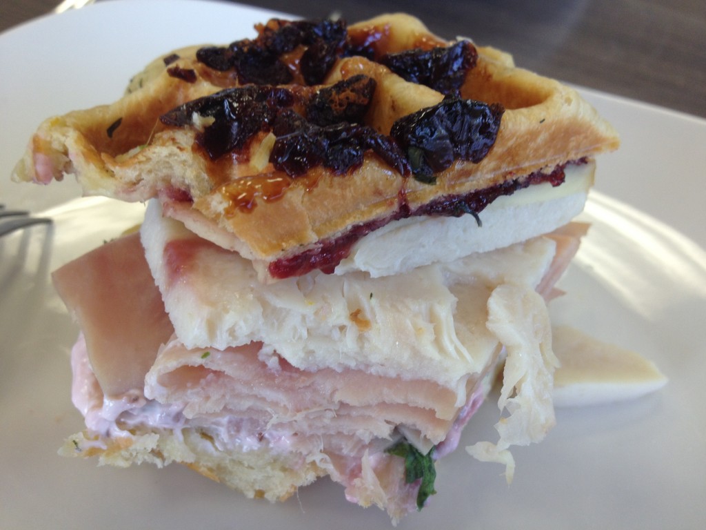 The Full Monte (aka Monte Cristo) features black forest ham, peppered turkey, swiss chard, gouda cheese, tart dried cherry waffle, sour cherry compote. / NatomasBuzz.com