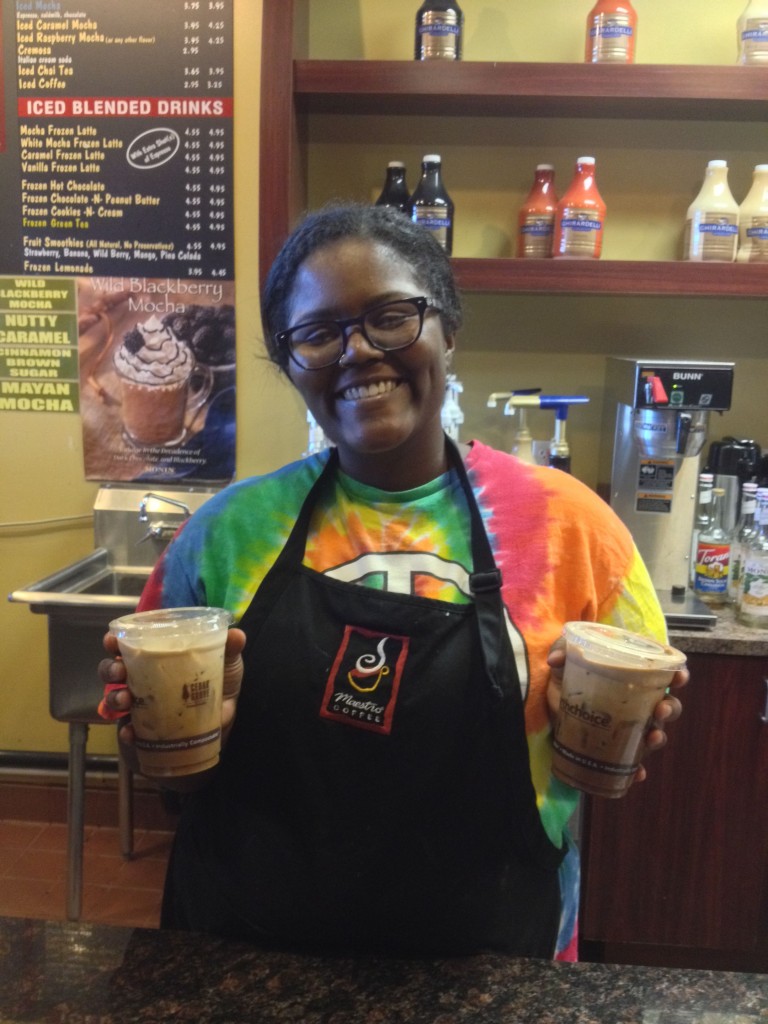Ravyn Graves serves up iced coffee drinks to help beat the heat.