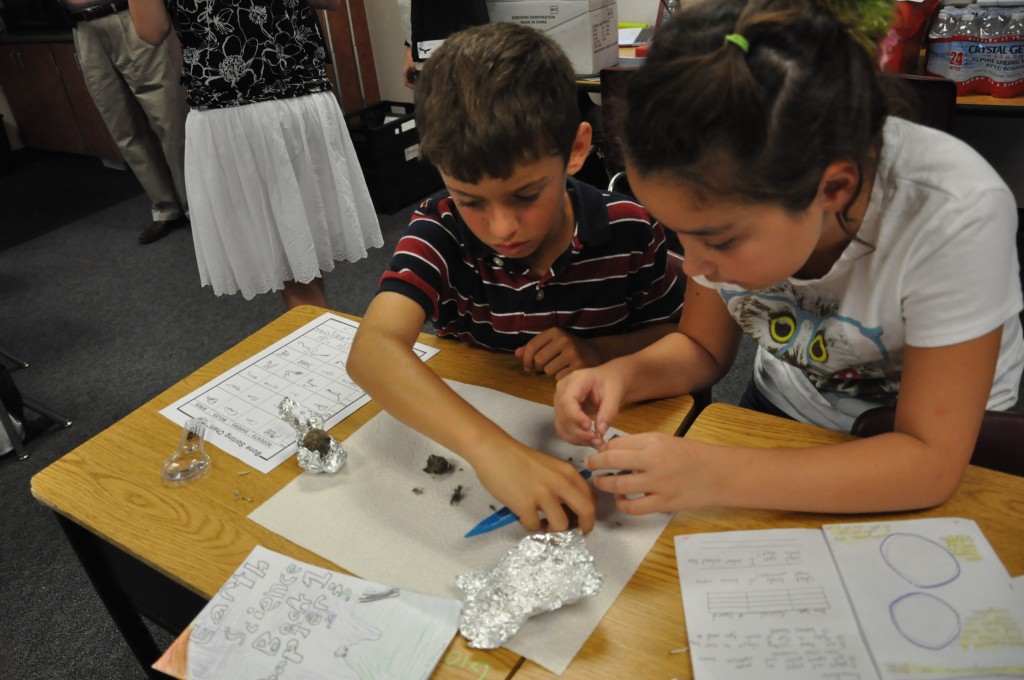 Students in Nicole Swonger's 4th grade class at Witter Ranch Elementary School dissect owl pellets. / Courtesy Photo