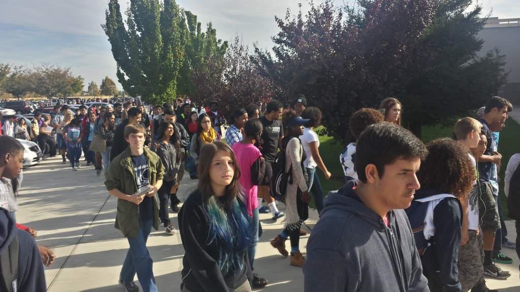 Students evacuate Inderkum High School as part of an earthquake safety drill on Thursday. 