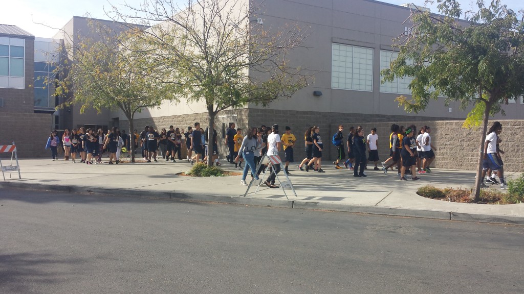 Students evacuate Inderkum High School as part of an earthquake safety drill on Thursday. 