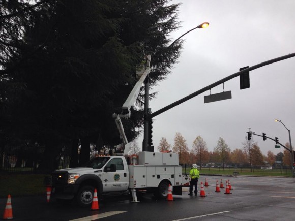 City workers remove PODs camera from the corner of San Juan and Truxel roads.