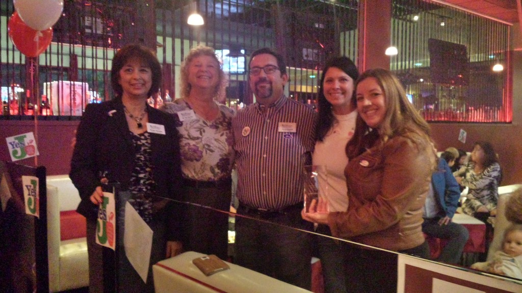 Natomas Unified school board members Sue Heredia, Teri Burns, Scott Dosick and Lisa Kaplan join Mayor Pro Tem Angelique Ashby to watch Measure J returns Tuesday night. / Photo: Marc Laver. 