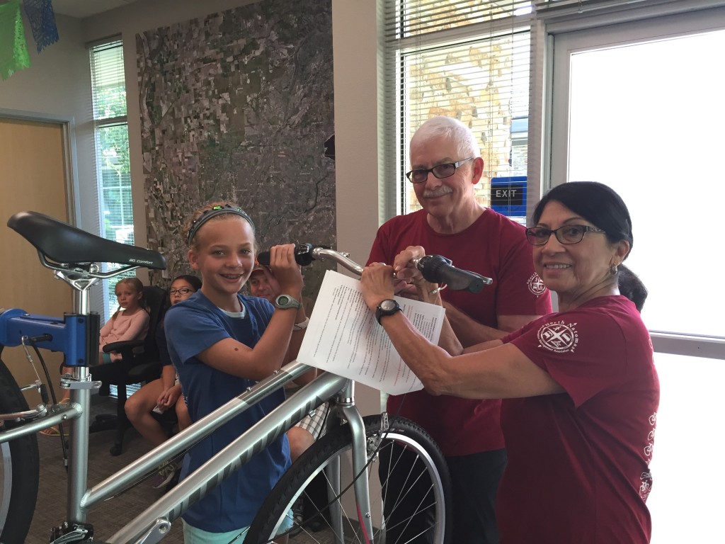 Mia May, Brett Rowlett and Lillian Rowlett during the rebuild. / Photo: NNTMA