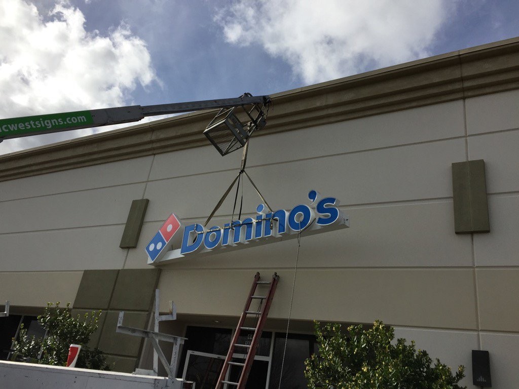 Signage for the new Domino's Pizza went up on Dec. 10. / Photo: B. Cook