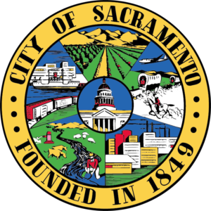 Image of city seal with the words "city of Sacramento founded in 1849" circling smaller images of the capitol building.