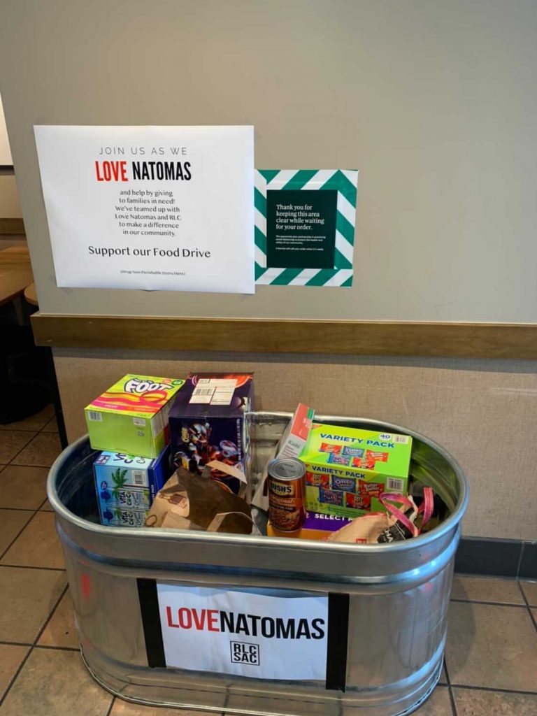 Image of galvanized metal tub full of non-perishable food items.