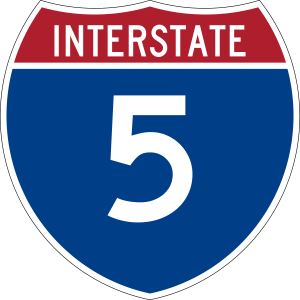 Image of Interstate 5 logo which is shaped like a shield and red, white and blue.