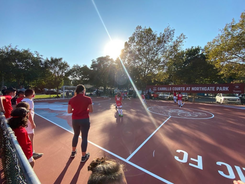 Image of players on futsal court.