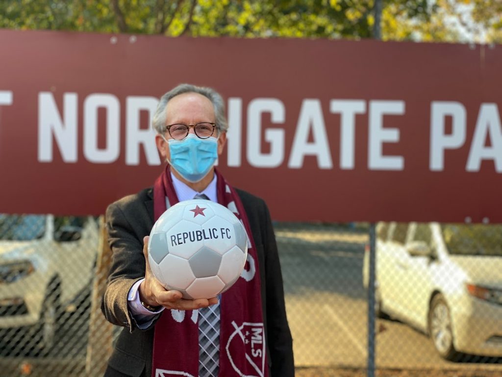 Image of Vice Mayor Jeff Harris holding out soccer ball.