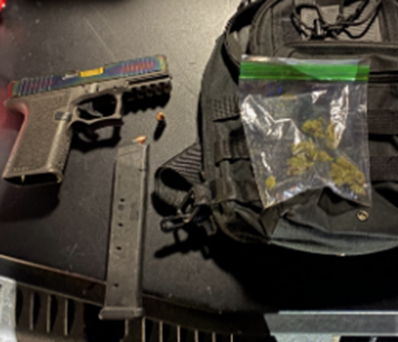 Image of gun, ammunition cartridge and drug paraphenalia.