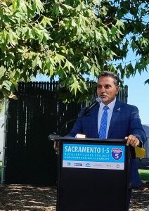 Man speaking at podium