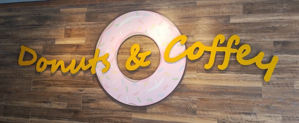 Donuts and Coffey sign